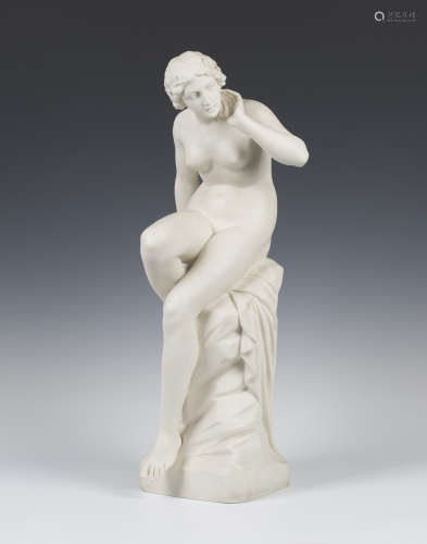 A large Gustafsberg Parian figure of Echo, circa 1908, modelled as a nude seated on a rocky