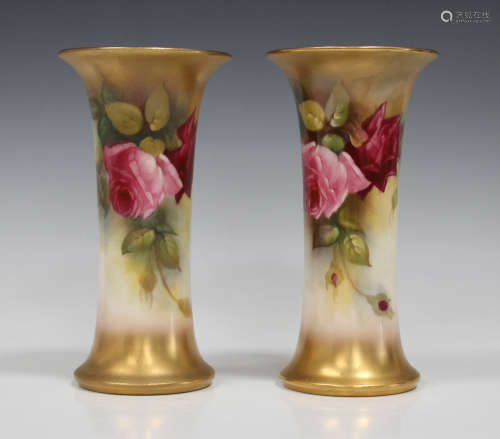 Two Royal Worcester porcelain vases, circa 1918, of flared cylindrical shape, painted by M. Hunt,