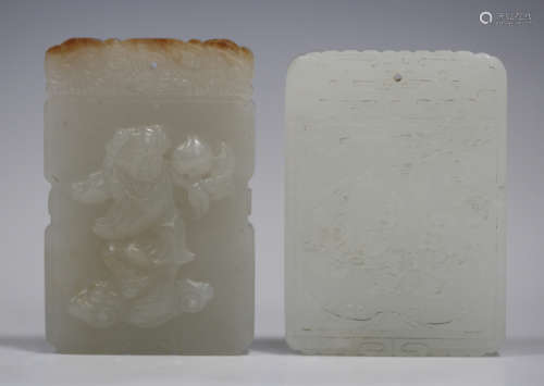 A Chinese pale celadon jade tablet pendant, one side carved in relief with a boy holding a peach