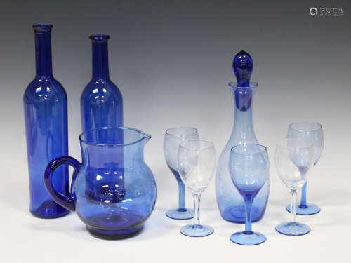 A collection of mostly blue tinted glassware, 20th century, including a decanter and matched