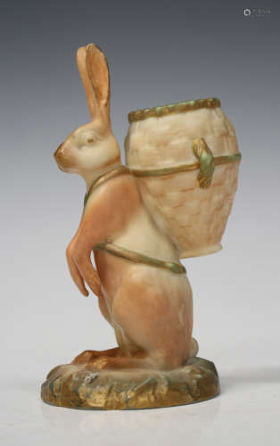 A rare Royal Worcester blush ivory porcelain Brer Rabbit posy vase, circa 1891, modelled standing