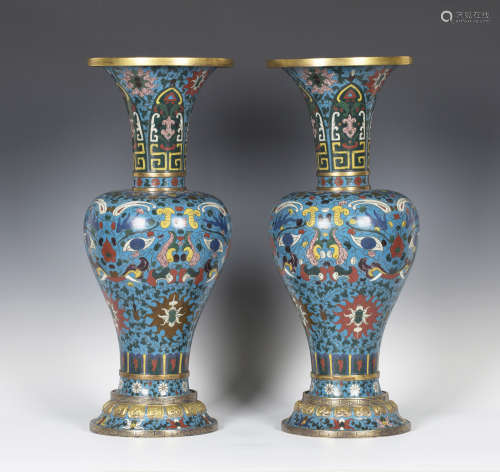 A pair of Chinese cloisonné turquoise ground vases, Qing dynasty, each baluster body decorated in