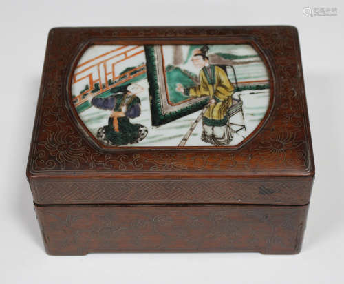 A Chinese inlaid hardwood rectangular box and cover, late Qing dynasty, the cover inset with a