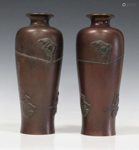 A pair of Japanese brown patinated bronze vases, Meiji/Taisho period, each shouldered tapering
