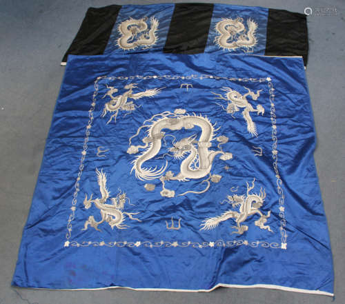 A Chinese blue silk embroidered rectangular panel, 20th century, worked in silver, grey, cream and