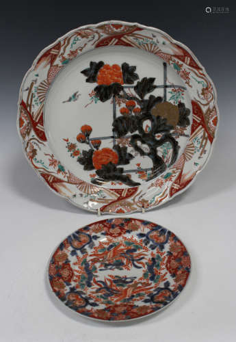 A Japanese Imari porcelain circular dish, Meiji period, painted with blossoming peony, diameter 33.