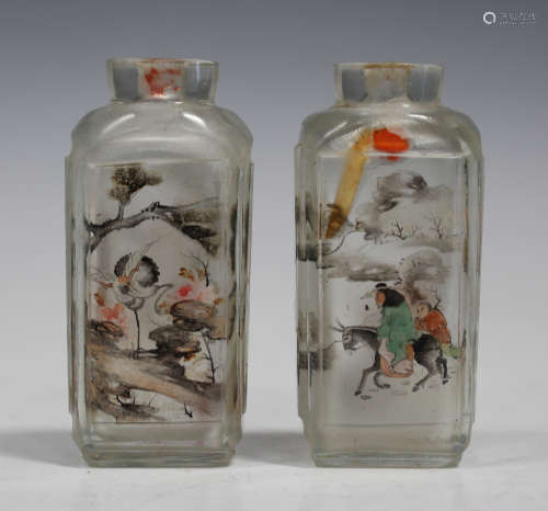 A pair of Chinese inside painted glass snuff bottles, 20th century, each of cut rectangular form,