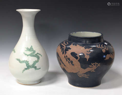 A Chinese Ming style porcelain vase, modern, the pear form body decorated with three green dragons