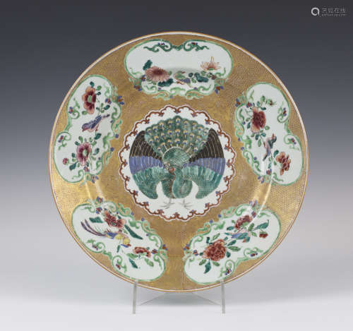 A Chinese famille rose export porcelain large circular dish, Yongzheng period, the centre painted