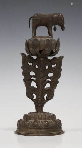 An Indian bronze ornamental column, probably 19th century, modelled as an elephant standing upon a