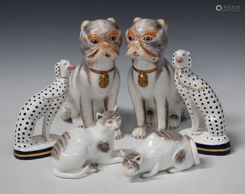 A pair of Meissen style Sutherland bone china models of seated pug dogs, 20th century, each