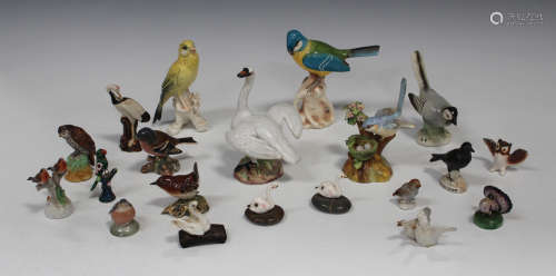 A Continental porcelain model of a mute swan, early 20th century, with open wings, unmarked,