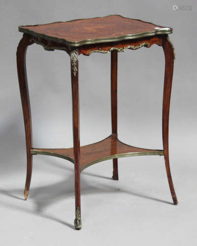 An early 20th century French kingwood and marquetry inlaid two-tier occasional table, the shaped top