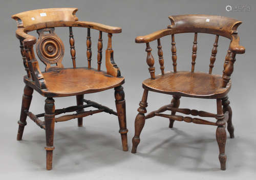 A late 19th century ash and elm tub back captain's armchair, height 80cm, width 63cm, together