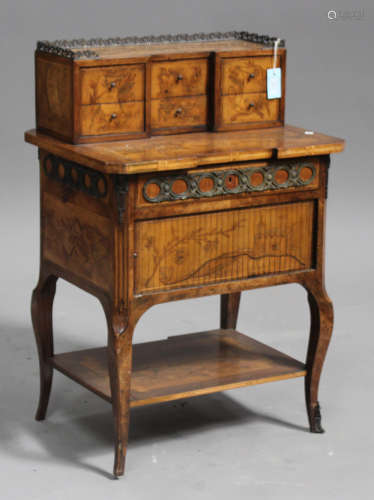 An 18th century French walnut and kingwood bonheur-du-jour with overall inlaid and penwork