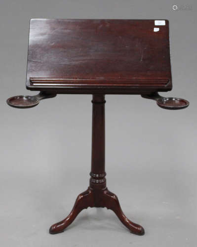 A 20th century mahogany reading table by Sussex Woodcraft Cabinet Makers, on a turned column and