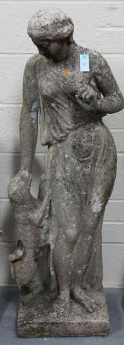 An early 20th century cast composition stone garden figure of a classical maiden with begging dog,