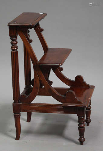 A late 20th century reproduction stained hardwood set of library steps, raised on reeded and splayed