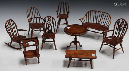 A small group of late 20th century wooden doll's house furniture, all inscribed 'F. & J.P.' to