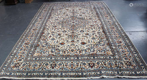 A Kashan carpet, Central Persia, mid/late 20th century, the ivory field with a shaped medallion,