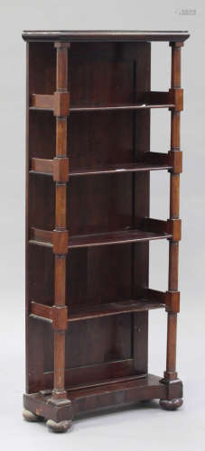An early Victorian mahogany five-tier open bookcase with galleried sides and turned supports, raised