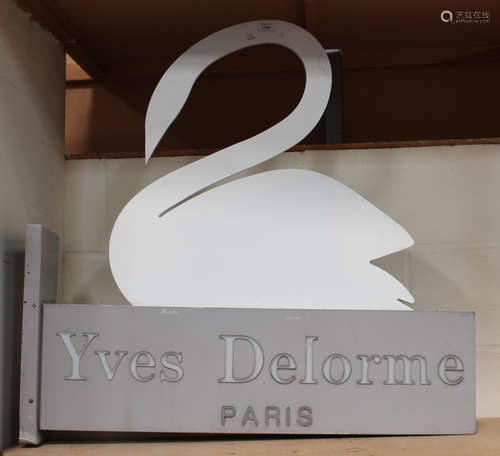 A mid/late 20th century 'Yves Delorme Paris' shop sign, height 81cm, width 83cm.Buyer’s Premium 29.