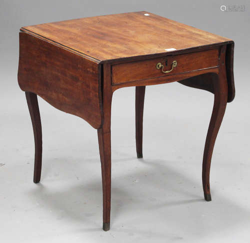 A George III mahogany butterfly Pembroke table, fitted with a frieze drawer, raised on cabriole