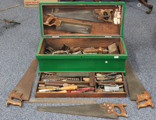 A large collection of tools, including American and Canadian saws, marking gauges, set squares,