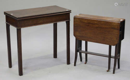 An Edwardian mahogany rectangular Sutherland occasional table with canted corners, on square