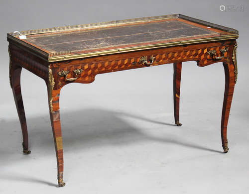 A mid-18th century French kingwood and parquetry veneered games table, the galleried leather inset