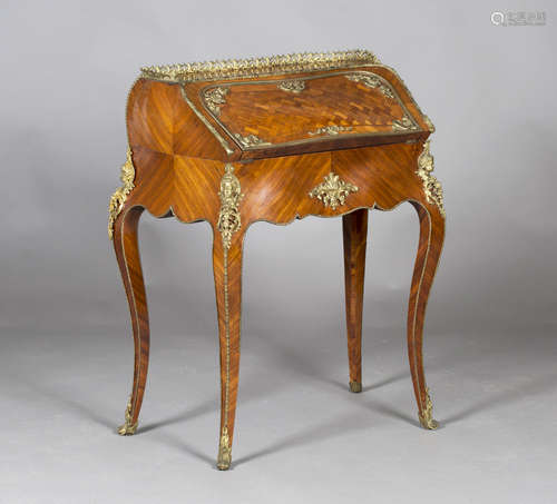 A late 19th century French Louis XV style parquetry kingwood lady's bureau with overall applied gilt