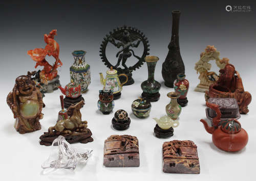 A collection of modern Chinese decorative items, including soapstone carvings, cloisonné vases and a