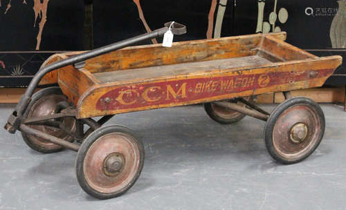 An early 20th century CCM bike wagon, bearing claret maker's branding to sides, length of wooden