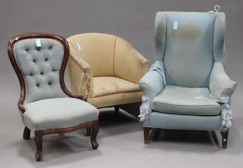 An early 20th century wing back armchair, height 103cm, width 77cm, together with a tub back chair