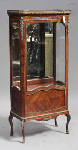 A late 19th century French kingwood and gilt metal mounted vitrine, the galleried top above a glazed