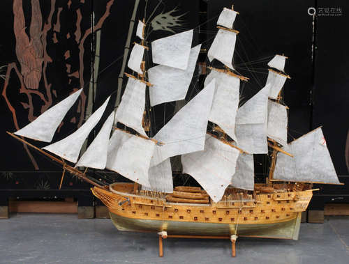 A late 20th century scratch built softwood model of a three-masted gunship, detailed with cloth