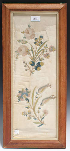 A silkwork floral panel, possibly 17th century, worked with two floral sprigs on a cream silk