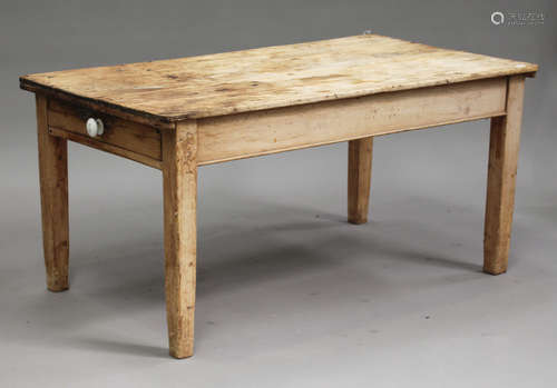 A Victorian pine rectangular kitchen table, fitted with a single drawer, on block legs, height 72cm,