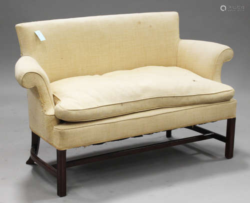 A 20th century George III style two-seat settee, on moulded block legs, height 84cm, width 145cm,