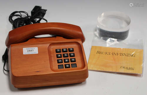 A late 20th century Swedish cherrywood Diavox telephone, width 22cm, together with booklet and