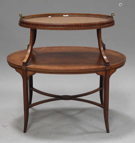 An Edwardian mahogany two-tier oval tray-top étagère with inlaid decoration, on splayed square