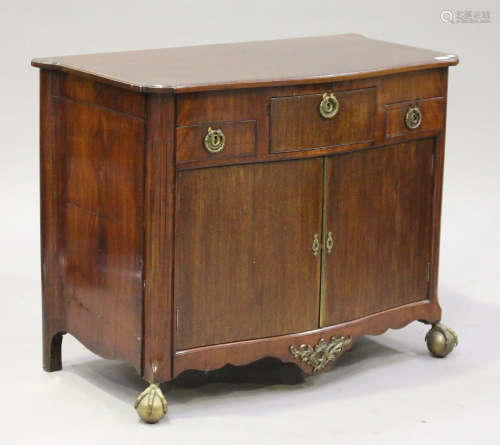 A 19th century French mahogany side cabinet with serpentine front, fitted with an arrangement of