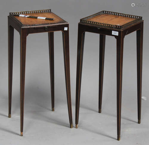 A pair of George III satin birch and harewood kettle stands, each galleried top and pull-out slide