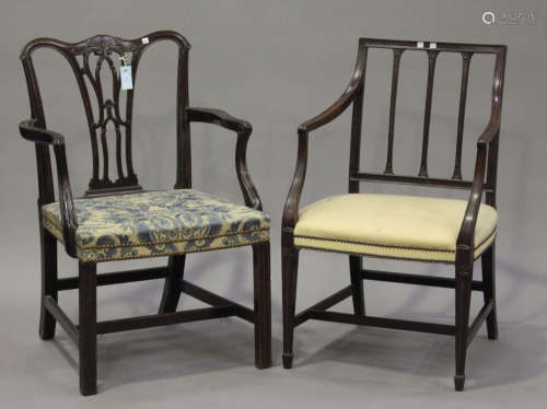 A George III mahogany pierced splat back elbow chair with an overstuffed seat, on moulded block