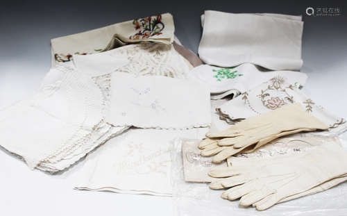 A small quantity of whitework, including linen tablecloths and placemats, two early 20th century