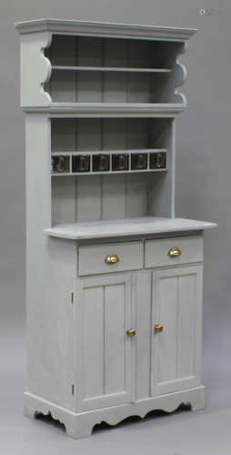 A 20th century grey painted pine kitchen dresser, the shelf back fitted with five moulded glass