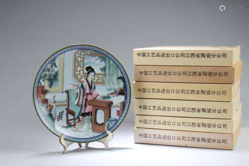 A Set of Six Round Decorative Plates