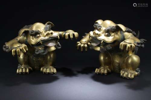 A Pair of Antique Gilt Bronze Mythical Beast Statues