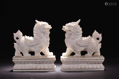 A Pair of Chinese Jade Mythical Beast Statue