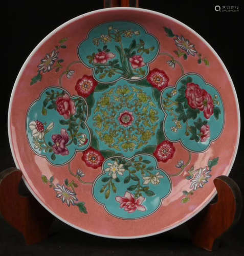 AN ENAMEL FLORAL PATTERN PLATE